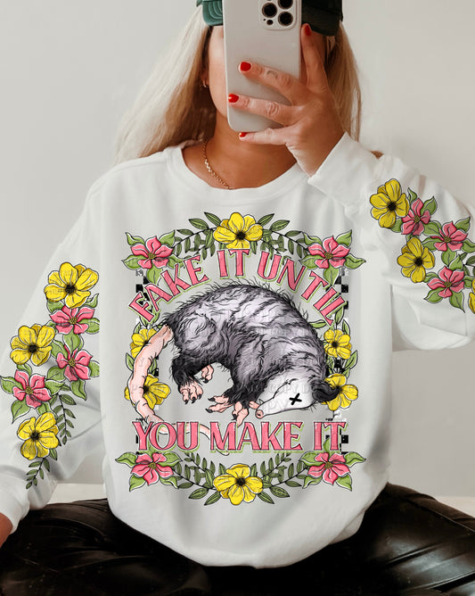 Fake It Till You Make It Sleeve Print T-Shirt or Sweatshirt - Add Some Fun to Your WardrobeBrighten Up Your Outfit with a Fake It Till You Make It Sleeve Print on a T-Shirt or Sweatshirt .