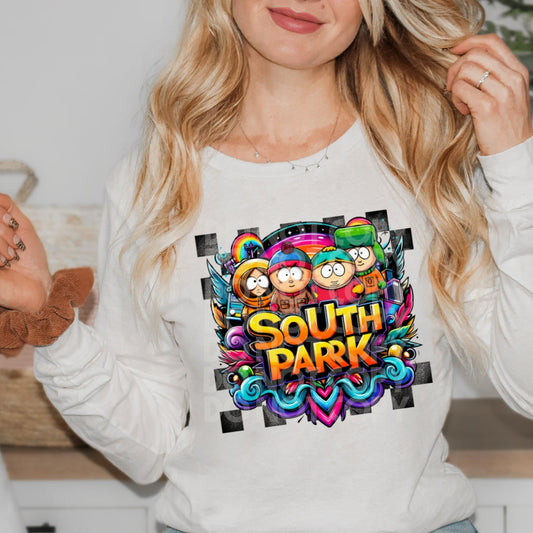 a woman holding a teddy bear wearing a south park shirt