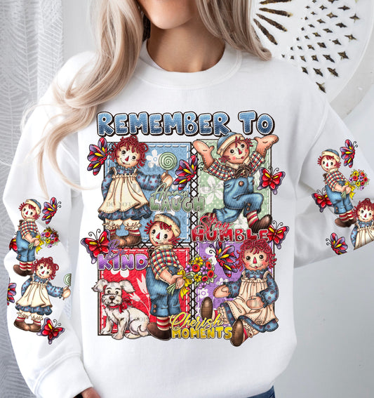 a woman wearing a white shirt with a picture of a couple of teddy bears on