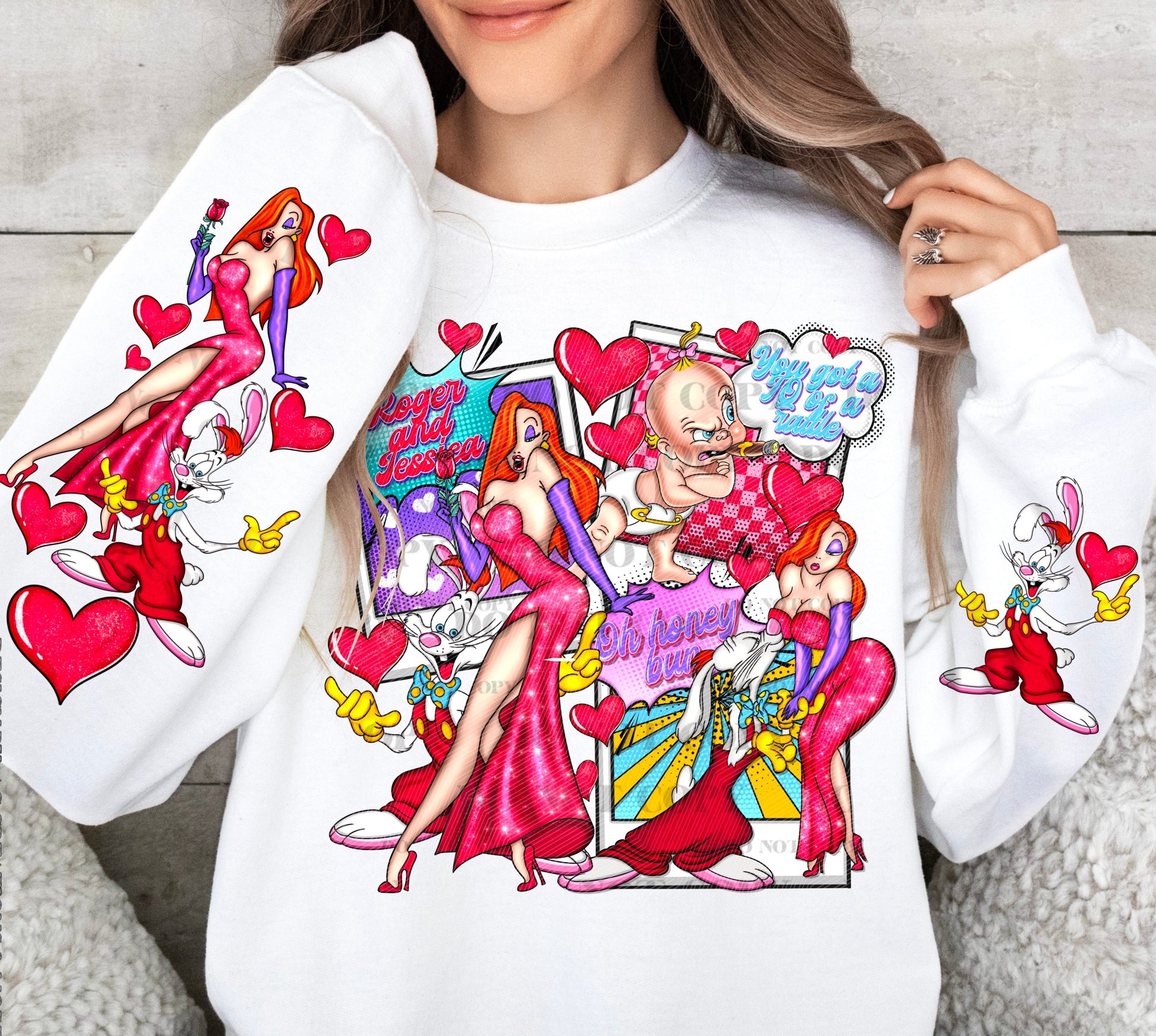 a woman wearing a white shirt with cartoon characters on it