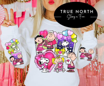 a woman wearing a white shirt with cartoon characters on it