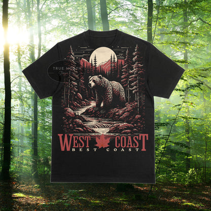 a black t - shirt with a bear in the woods