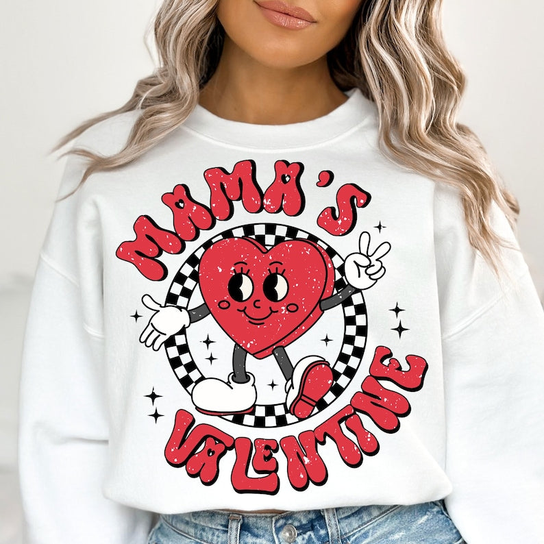 a woman wearing a white sweatshirt with a red heart on it
