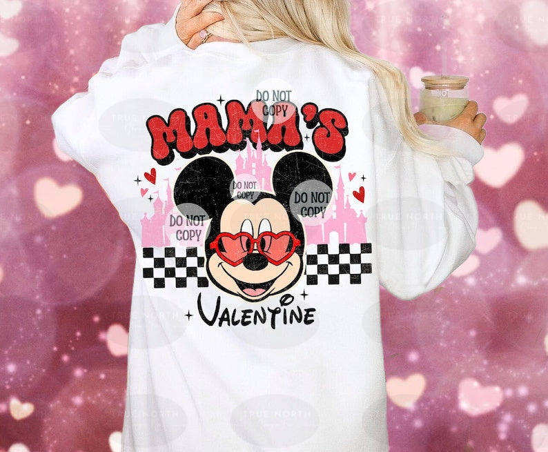 a woman wearing a minnie mouse shirt with a cup of coffee