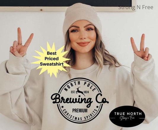 North Pole Brewing Co Sweatshirt - Premium Christmas Spirit and Style .